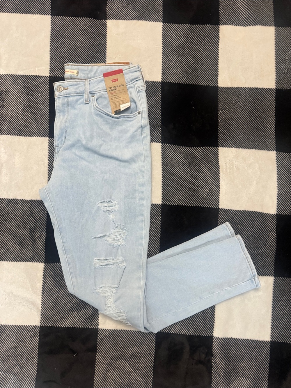 Levi's 721 high rise Light Wash Skinny Jeans with Distressed Knees
